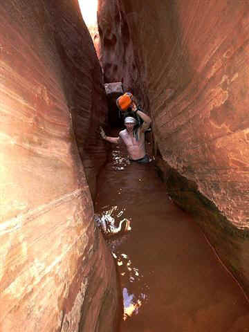 Bruce Neumann wading through Davis Gulch