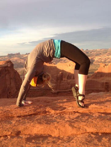 Melanie passing time in Not Tierdrop Canyon - Arches National Park