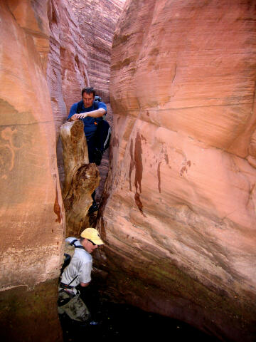 Climbing and wading through the slot