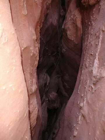 Chimney downclimb in North Fork of Lost Spring Canyon